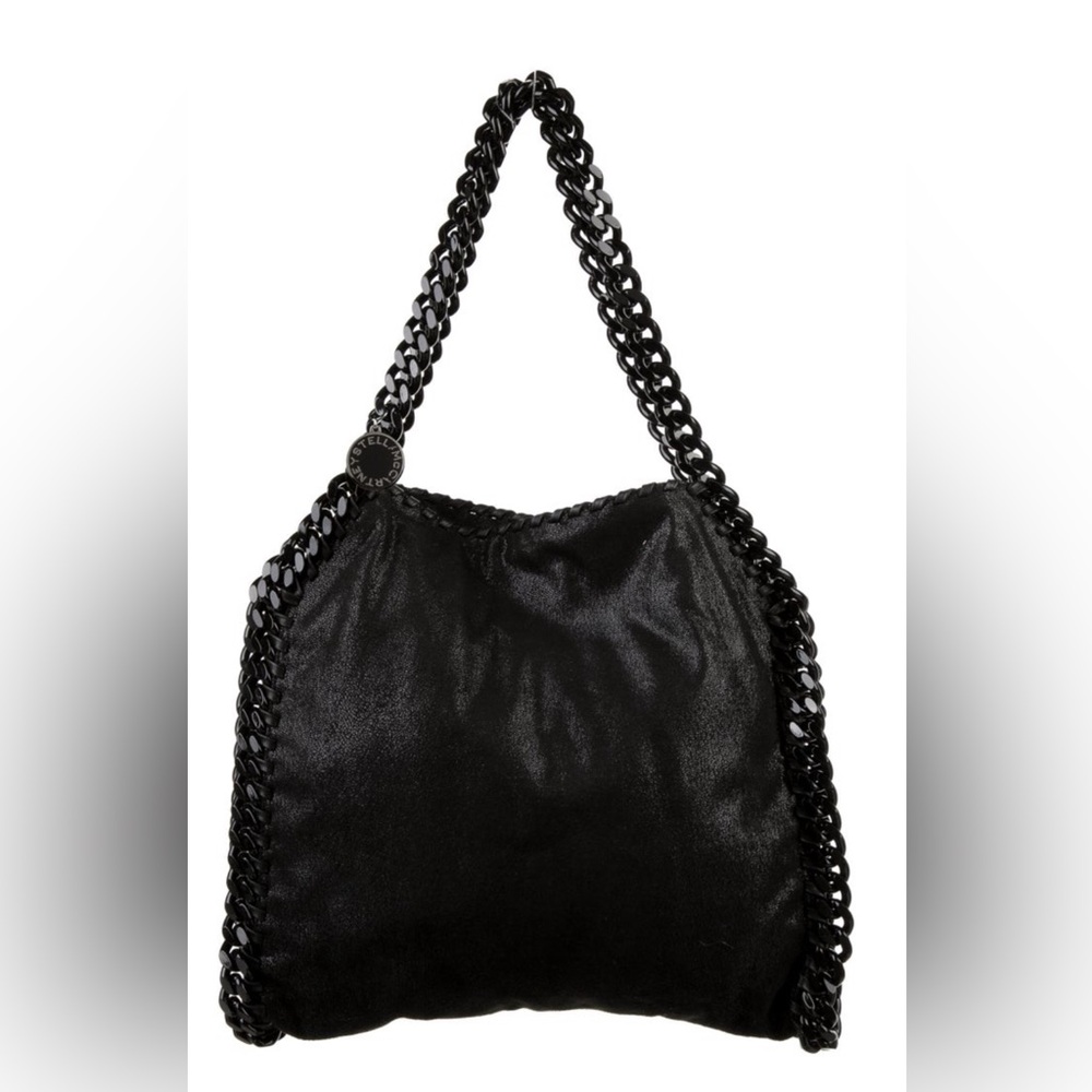 Stella McCartney
Black veg. suede
Tonal hardware
Shoulder strap drop 10”
H 14”